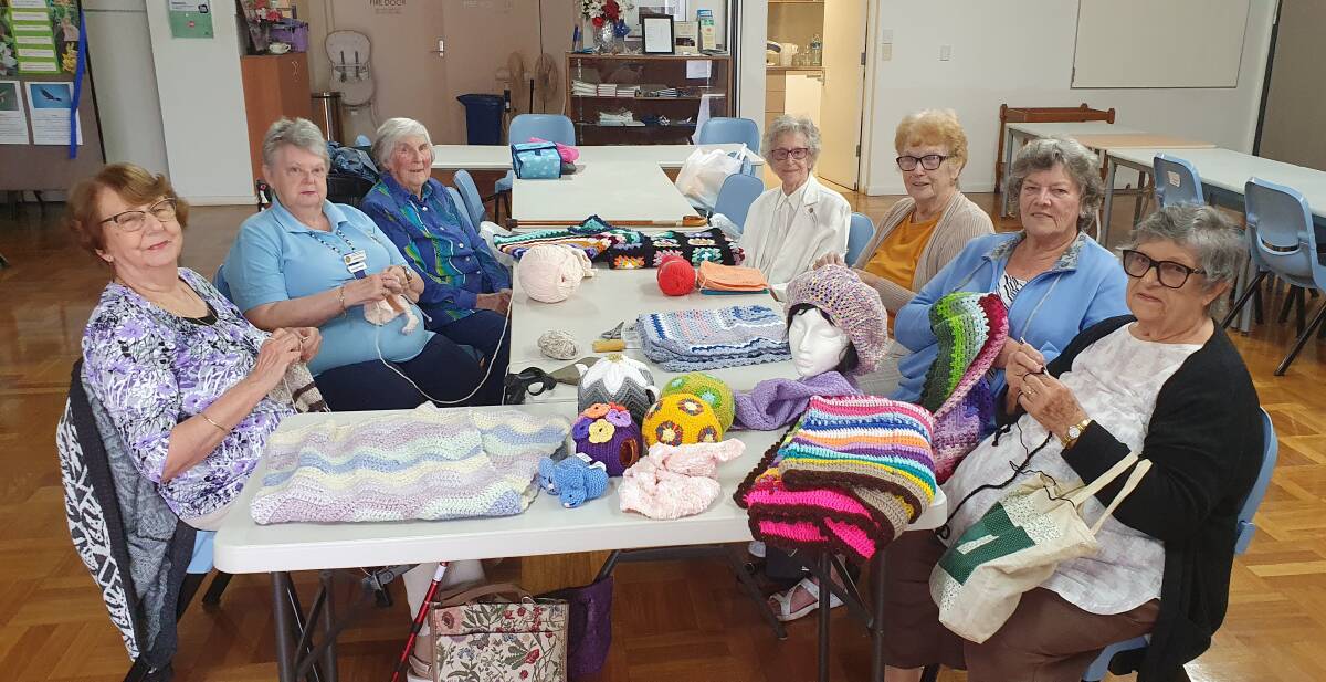 Craft time: (front left) Ann Schaffar, Gloria Burgess, Mona Logan, (front right) Margaret Wilson, Marilyn Brown, Olga Rohan and Miriam Hill hone their craft skills at the Port Macquarie CWA rooms.