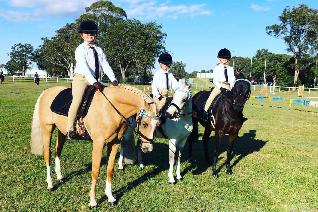 Ava, Ivy and Mia Basanovic take part in Port Macquarie Pony Club activities. Photo: Port Macquarie Pony Club