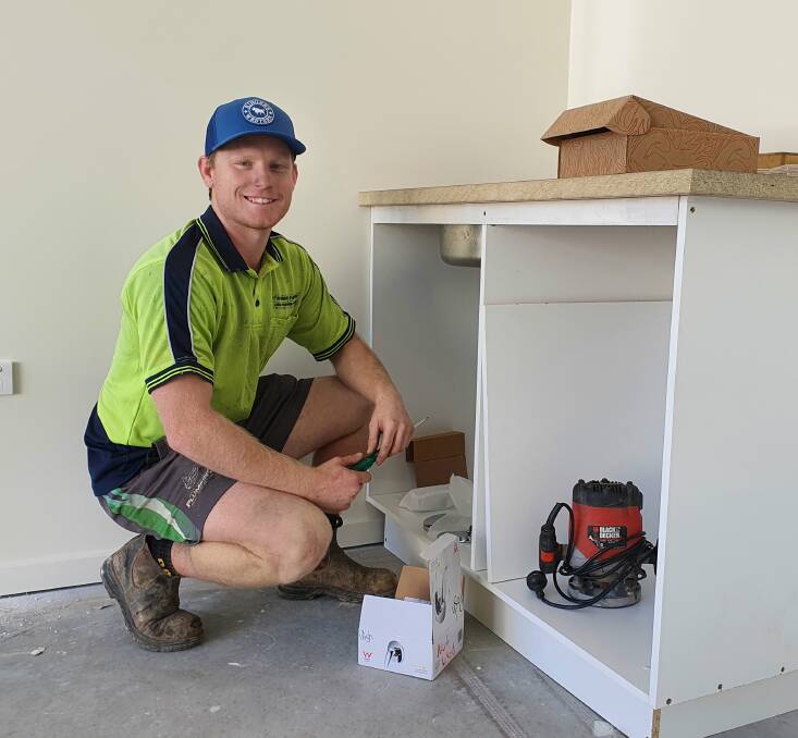 Job satisfaction: Affordable Plumbing's second year apprentice Jake Flanagan enjoys the variety in his work.