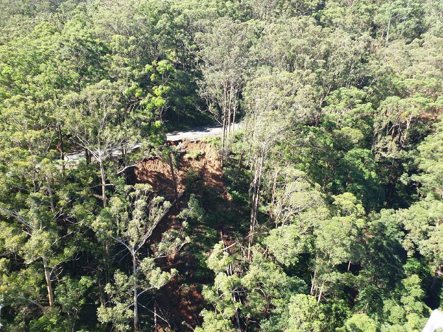  An aerial view shows a damaged section of Comboyne Road. Photo: Port Macquarie-Hastings Council