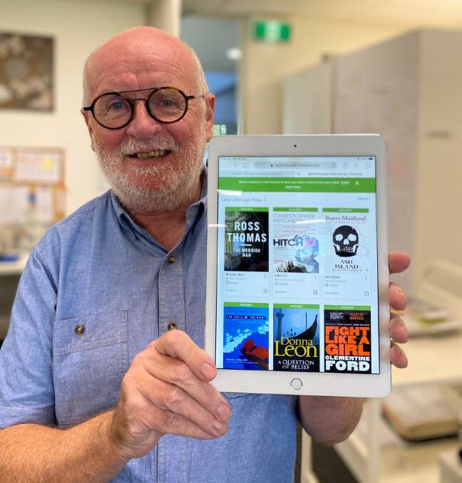 Online collections: Library manager Jim Maguire encourages the community to explore the library's online resources.
