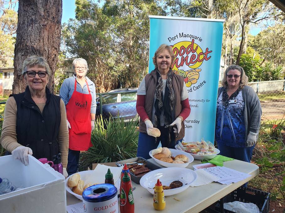 Barbecue time: Food Connect volunteers Lynn Maltman and Vicki White, Port Macquarie Neighbourhood Centre coordinator Julie Trowbridge and Tracy Colgan from The Buttery help out at a barbecue breakfast.