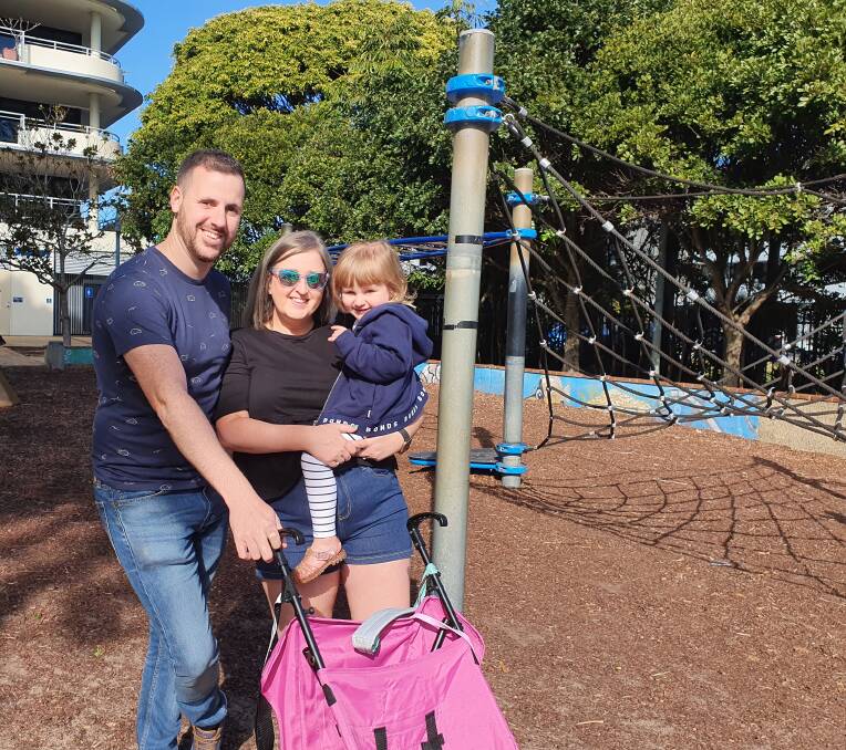 Time to relax: Holidaymakers Jason Edwards, Siobhan Avarl and their daughter Imogen Edwards visit Town Green playground.