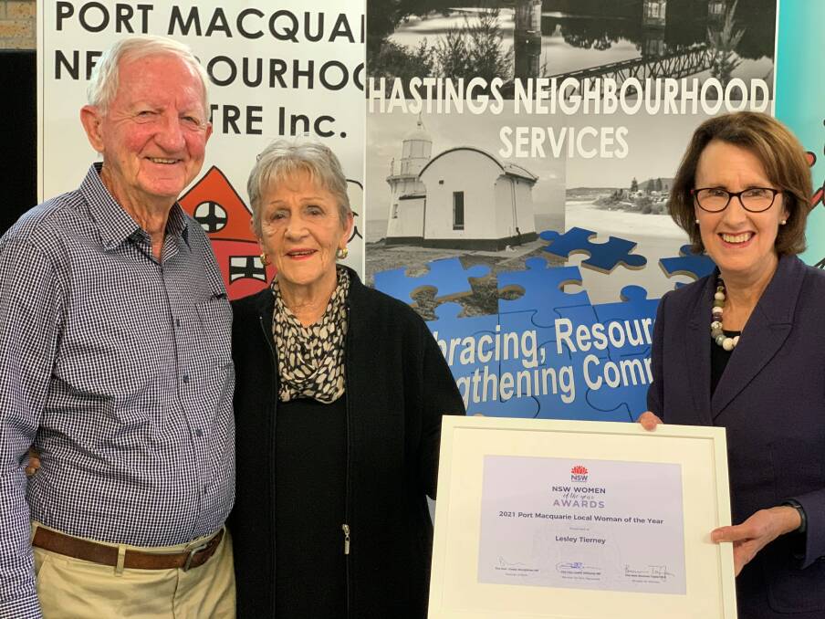 Community contribution: Port Macquarie MP Leslie Williams (right) presents the 2021 Local Woman of the Year Award to Lesley Tierney as Brian Tierney looks on.