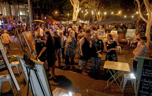 Community support: ArtWalk attracts a crowd to the Port Macquarie CBD to experience arts and cultural activities. Photo: Lindsay Moller Productions