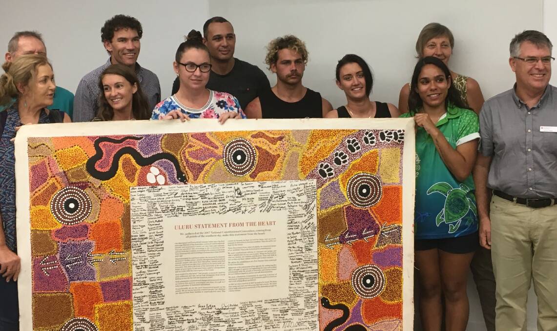 Uluru Statement advocate Thomas Mayor and supporters at Charles Sturt University Port Macquarie.