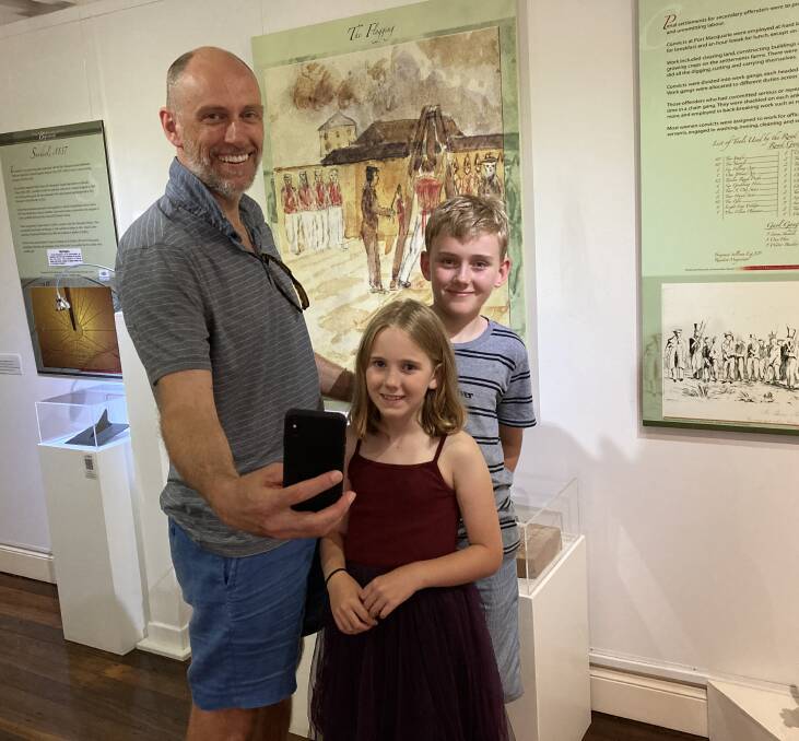 Creating memories: Lucas, Esther and Marcus Shipway from Sydney get ready for Museum Selfie Day at Port Macquarie Museum. 