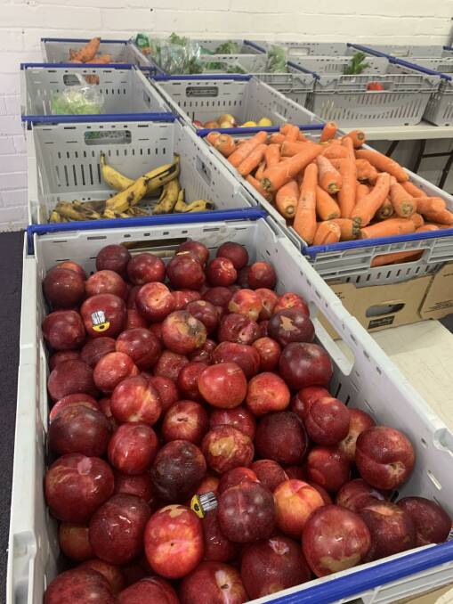 Nutritious food: Fruit and vegetables in the chiller were given away after power was lost.