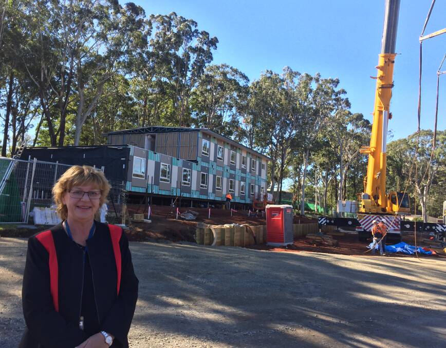 Building blocks: CSU Port Macquarie head of campus Professor Heather Cavanagh looks over progress on the student accommodation site. 