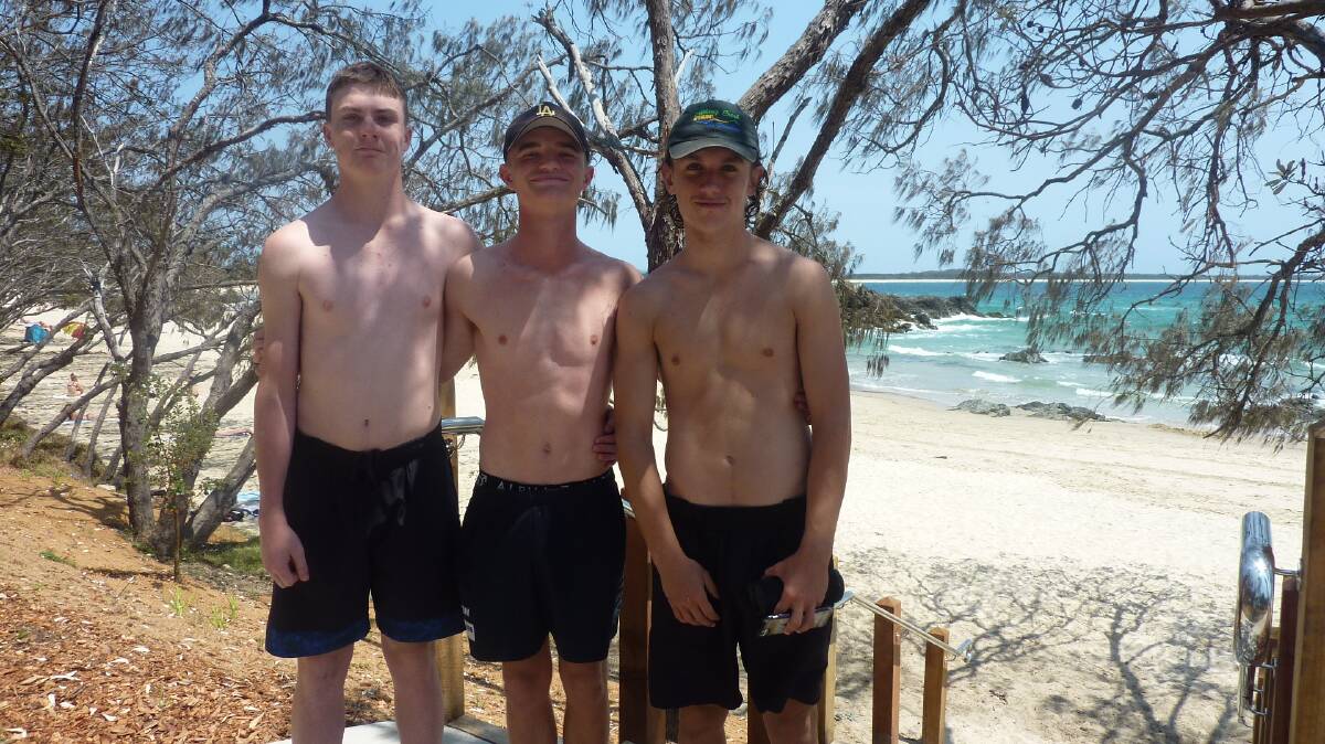 Mitchell Simmons, Caleb Blanch and Daniel Parry-Watson are happy with the upgraded section of the Coastal Walk.