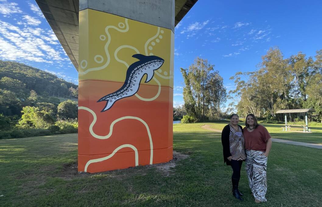 Aboriginal artists Angela Marr and Mel Streater collaborated to create the murals on the Wilson River bridge pylons at Telegraph Point. Picture by Lisa Tisdell
