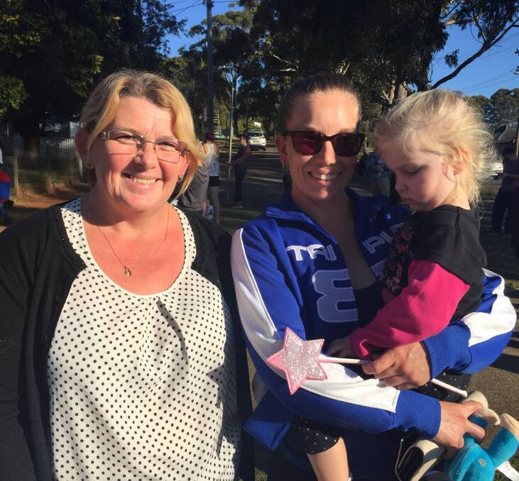 Parents' views: Bronwyn Eyles and Sallie Johnston, with four-year-old Melanie, support changes to the public school uniform policy.