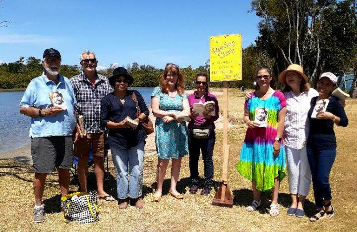 Great outdoors: The Reading Circle's Tom Taylor, Rob Cartwright, Mary Waterton, Alison Powell, Julie Edwards, Tracey Donovan, Christene Robinson and Naneth Leonero gather at Settlement Point. Photo: Supplied