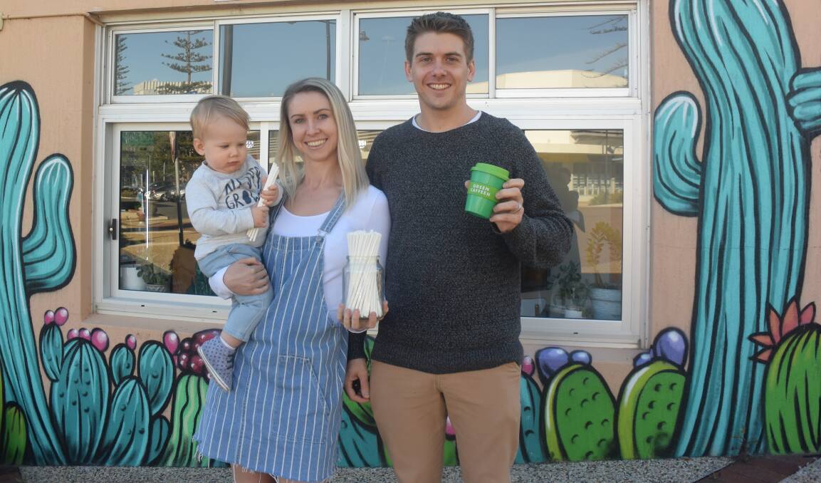 Environmentally friendly: Four Espresso owners Alicia and Steve Payne, with Bronson, showcase paper straws and the Green Caffeen scheme.