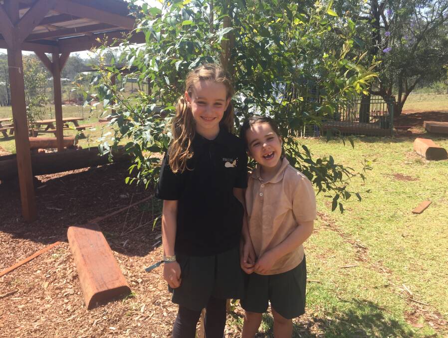 Helping others: Anwen and Elsie Pullen recognise the importance of our koalas.