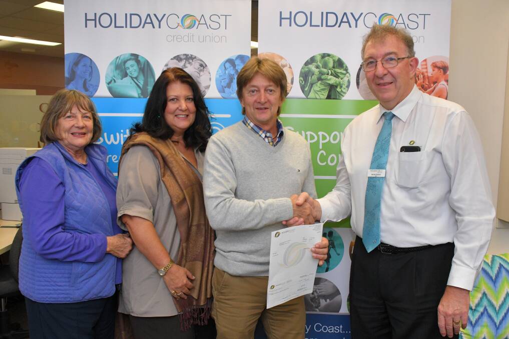 Thank you: North Side Progress Association representatives Narelle Milligan, Carla McKern and Kingsley Searle accept the grant from Holiday Coast Credit Union CEO Neville Parsons.