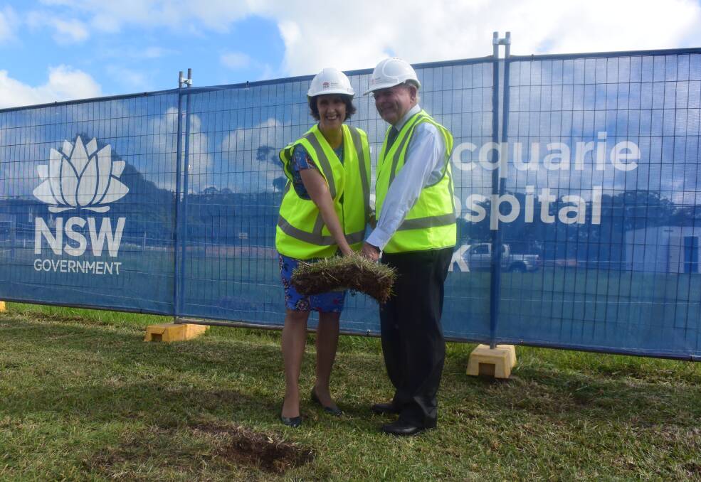 Much-needed project: Port Macquarie MP Leslie Williams and Mid North Coast Local Health District Governing Board chairperson Warren Grimshaw turn the first sod on stage one of the base hospital car park expansion.