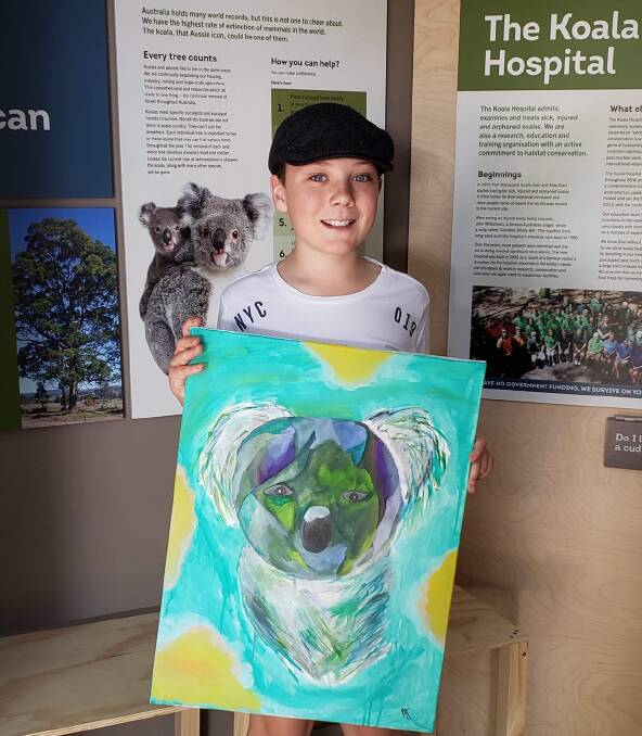 Generous gesture: Drawn to Art student Rhys Jones donates the painting to Port Macquarie Koala Hospital.