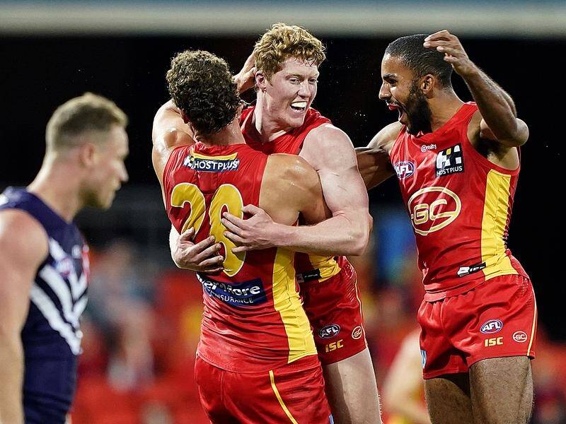 Gold Coast Suns face a COVID-19 inspired spell on the road after a bright start to the AFL campaign.