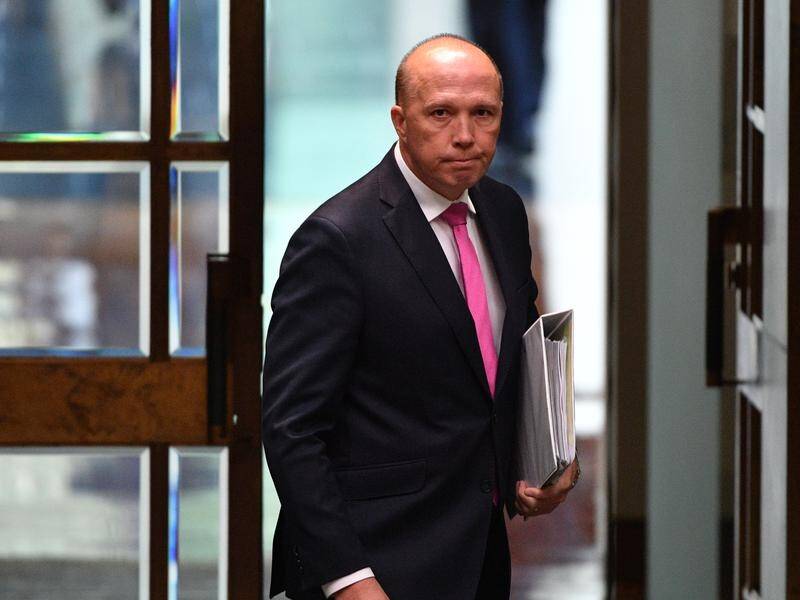 Peter Dutton says child refugees on Nauru will never be allowed to settle permanently in Australia.