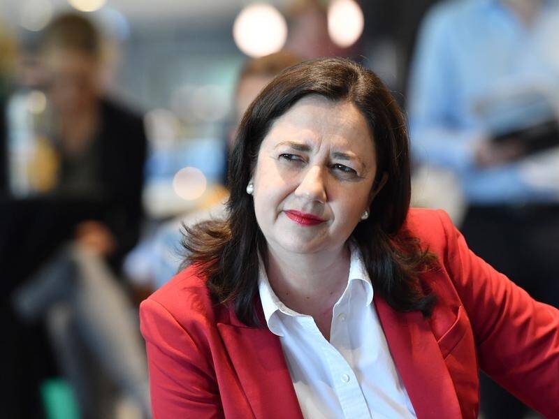 Queensland Premier Annastacia Palaszczuk has defended hiring pollsters to guage COVID restrictions.