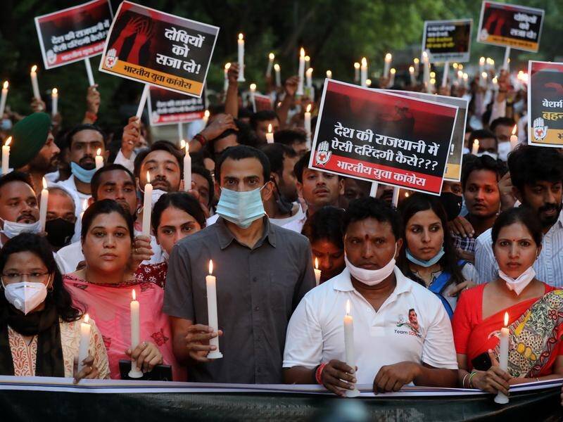 Protesters rallied in New Delhi, angry over the alleged rape and murder of a nine-year-old girl.