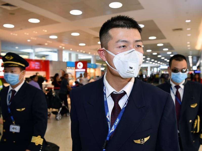 Passengers and crew on board a flight from Wuhan to Sydney had health checks on arrival.