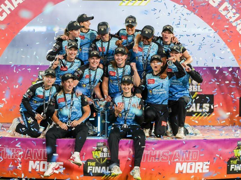 Adelaide Strikers enjoying their victory in the WBBL final over Brisbane Heat at the Adelaide Oval. (Matt Turner/AAP PHOTOS)