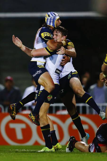 Cowboy power: Here's the view I want to see in October. Johnathan Thurston and Coen Hess celebrate a try for the North Queensland Cowboys.