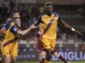 Roma's Tammy Abraham celebrates the second of his two goals in the 3-0 victory over Torino.