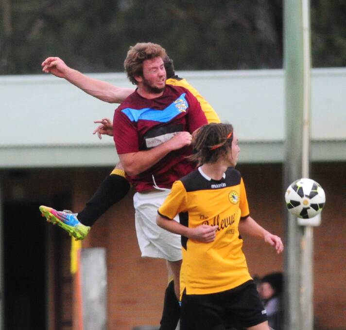 He's out: Jordan Morris contests a header for Port FC on Saturday against Tuncurry Forster Tigers. He'll miss tomorrow night's match against Camden Haven Redbacks thanks to a suspension from a red card on Saturday.