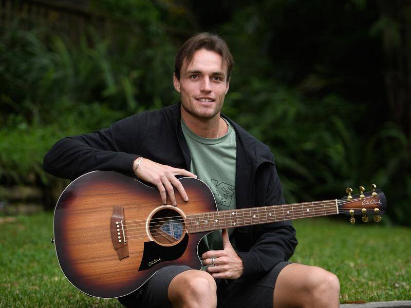 Australian tennis player Chris O'Connell is learning the guitar during his sporting layoff.