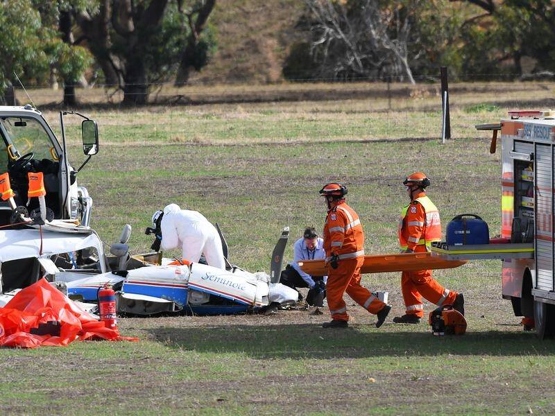 A mid-air collision between two planes that killed four people in Victoria is being investigated.