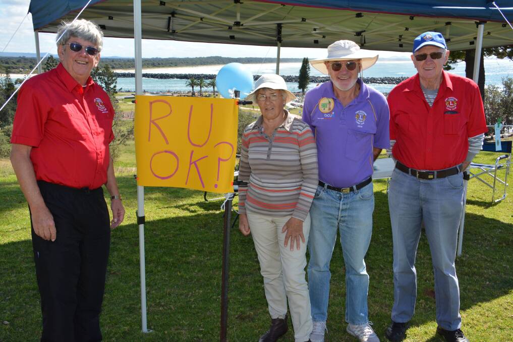 Friendly query: Port Macquarie Lions Club's Gerard Billing, Shirley Oakes, Colin Hardwick and John Howley ask the basic but important question yesterday.