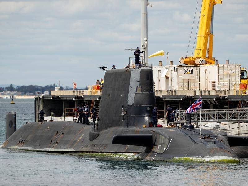 Australia has committed to building and operating its first nuclear-powered submarines. (Richard Wainwright/AAP PHOTOS)