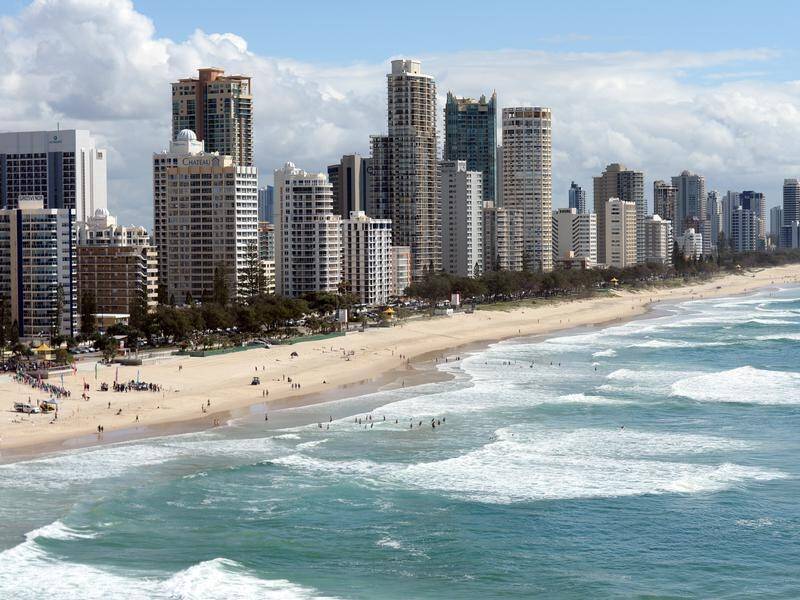 A bitter dispute over a Surfers Paradise high rise building has resulted in five men being sued.
