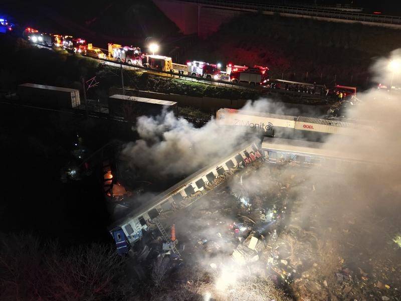 At least 57 people died after a passenger train and a freight train collided in central Greece. (AP PHOTO)