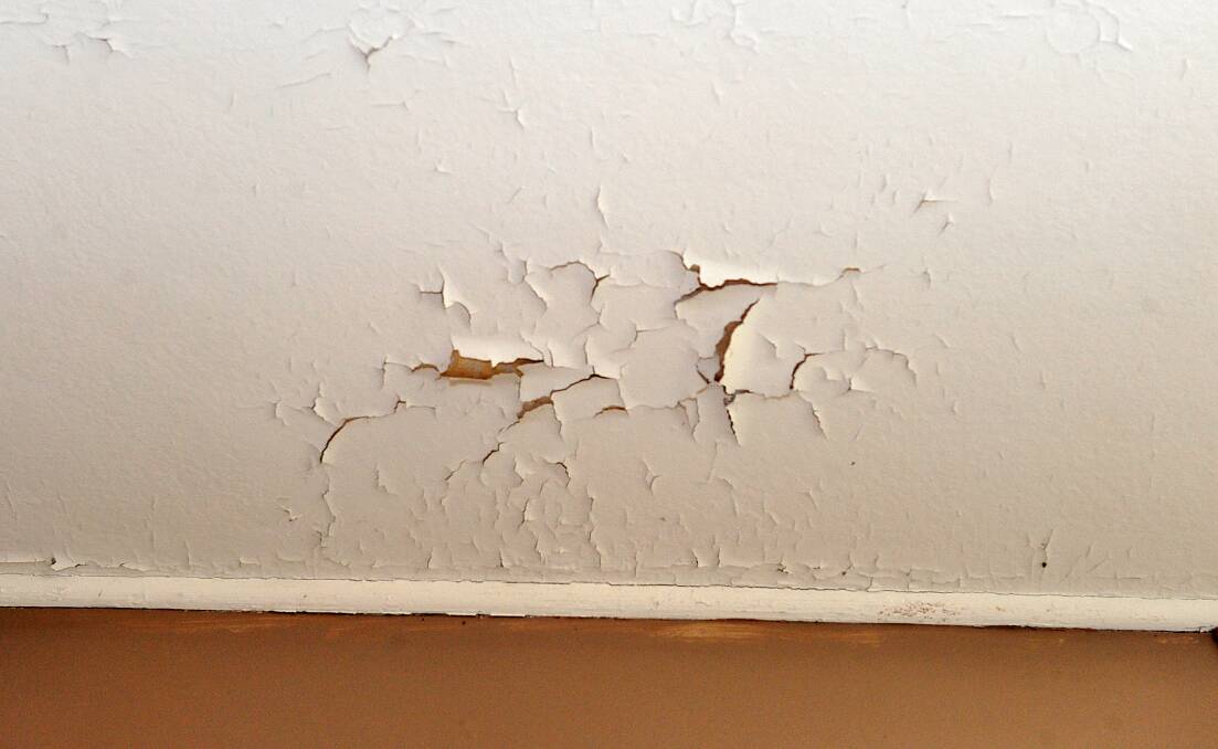 Sign of Damage: Paint flaking away and cracks in ceilings can often be a sign of damage to plaster. This can present a risk especially if the plasterboard is pulling away from the wall or ceiling stud behind it. Photo: Hayley Mills.