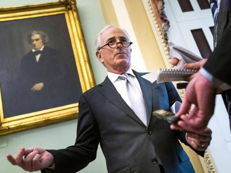 Senate Foreign Relations Committee chairman Bob Corker talks to reporters before the vote.