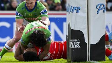 Talatau Amone scores one of his three tries in St George Illawarra's loss to Canberra. (Lukas Coch/AAP PHOTOS)