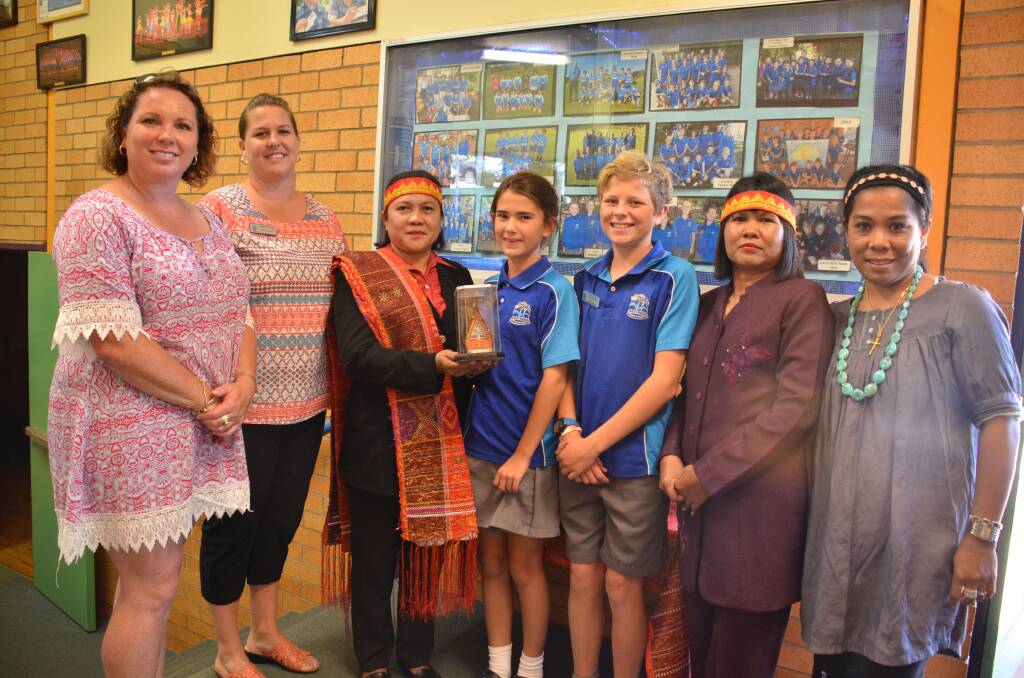 Mututally beneficial visit: Hastings Public School teachers Mel Bourne and Erin Barker have been the driving force behind the successful program which attracted Theresia Sianapur (third from left) and Lince Nainagolam (second from right) to Hastings Public School. They are pictured here with school prime ministers Tait McIntyre and Jesse Beard and translater Ike Mitchell.