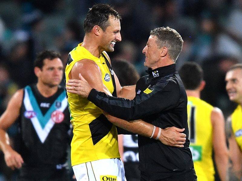 Toby Nankervis (l) and Tigers head coach Damien Hardwick enjoyed the thrilling win over the Power.