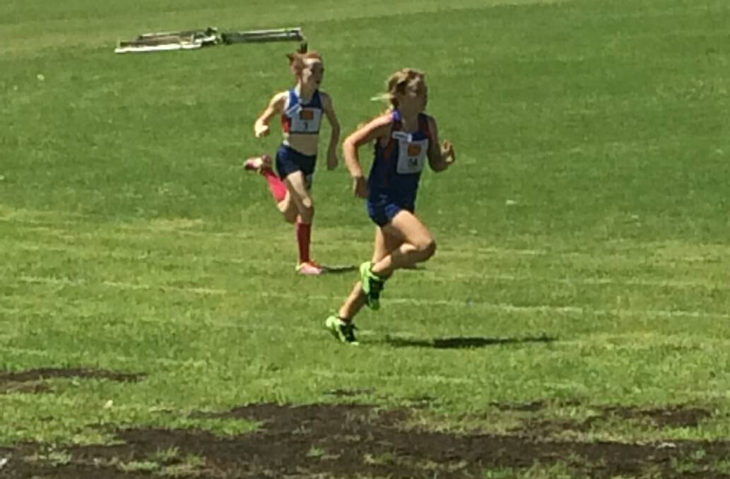 Competitive: Susie Coster and Kellie Burke running at the zone carnival.