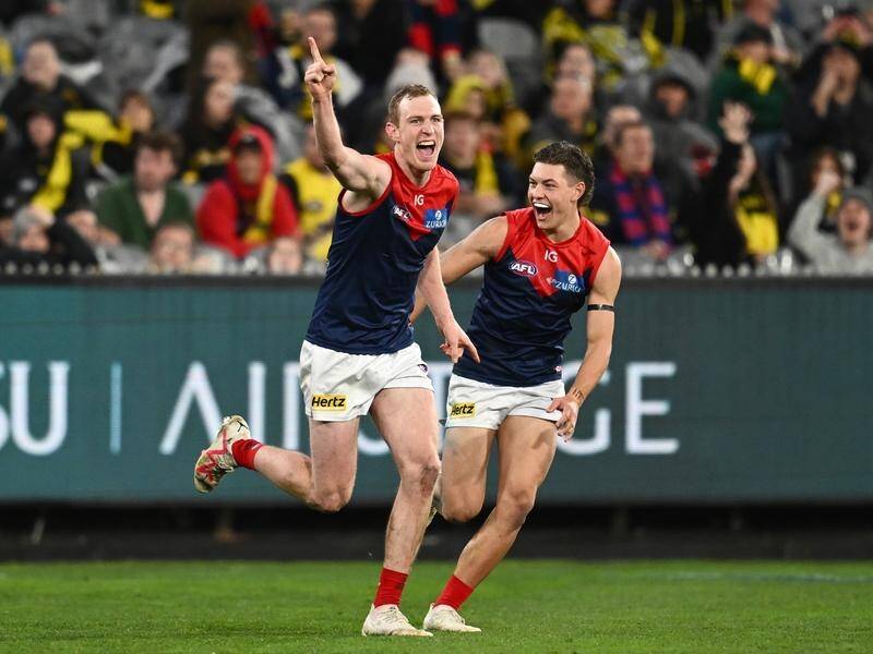 Harrison Petty (left) starred as Melbourne scored a 32-point AFL win over Richmond at the MCG. (Joel Carrett/AAP PHOTOS)