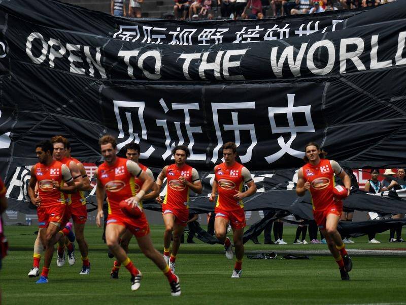 Trade Minister Steve Ciobo will see the Gold Coast Suns play Port Adelaide in Shanghai, China.