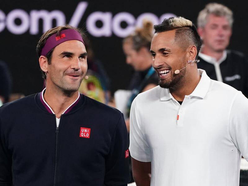 Roger Federer and Nick Kyrgios enjoy a laugh at the Rally for Relief in Melbourne.
