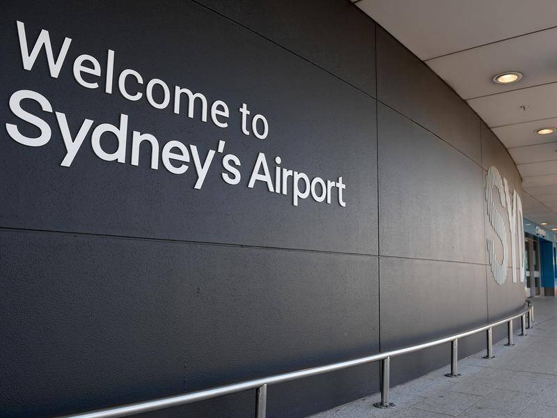 A man in his 70s allegedly sexually touched a female cafe worker at Sydney Airport.