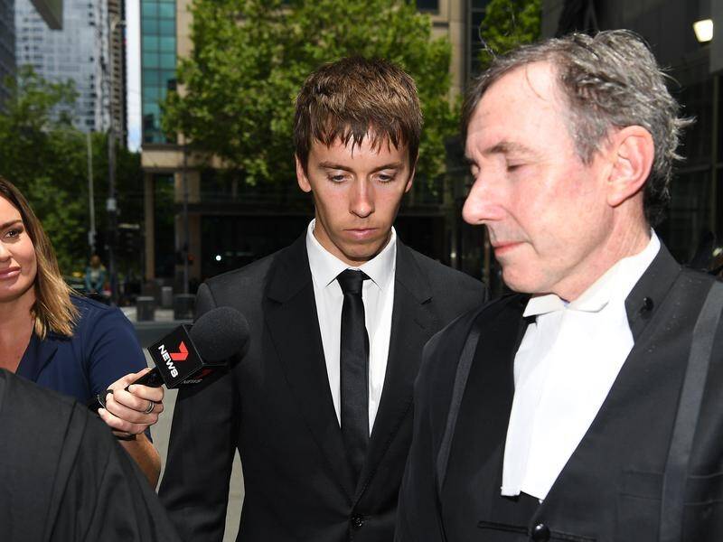 James Haberfield (centre) has again avoided going to jail for bashing a female paramedic.