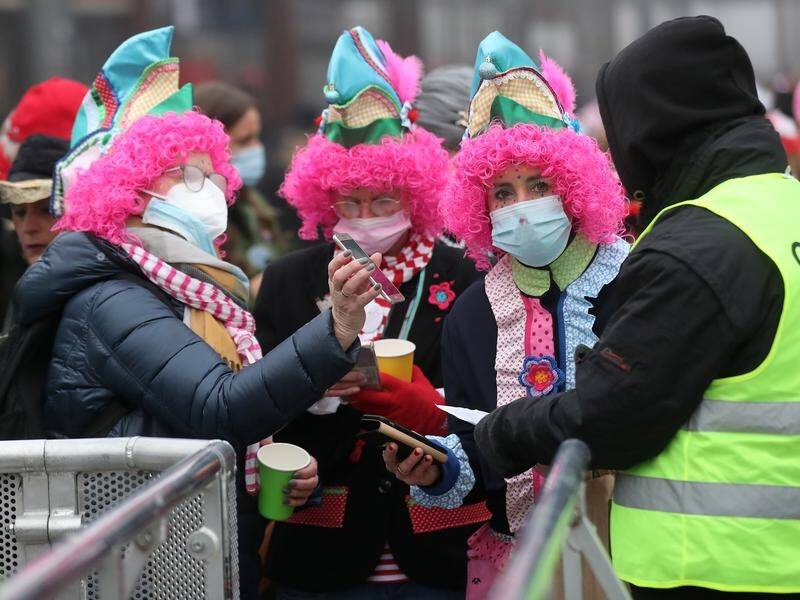 Revellers in Cologne must show proof of vaccination to access some areas at the German carnival.