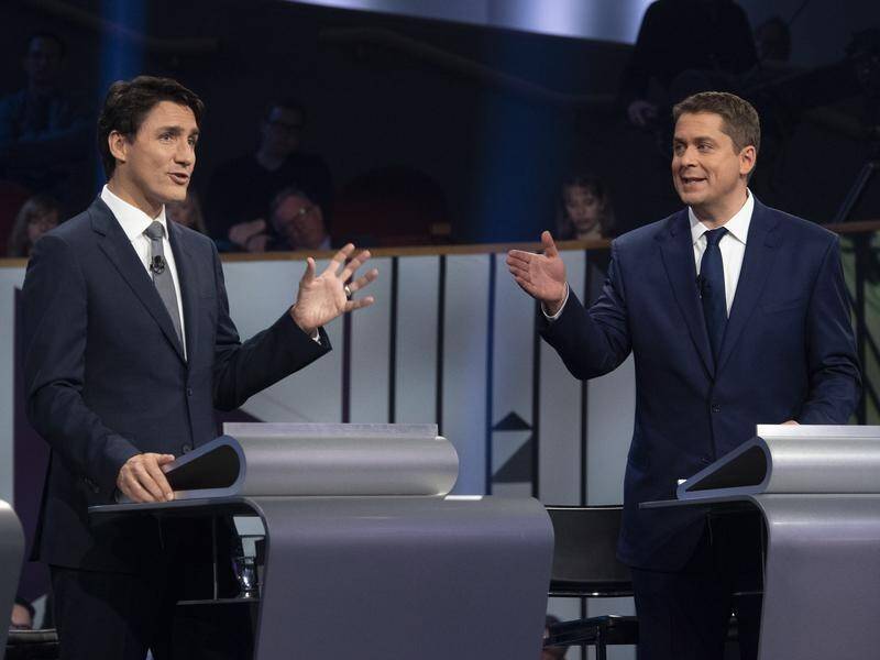 Canadian PM Justin Trudeau faces a tough election challenge from Conservative leader Andrew Scheer.